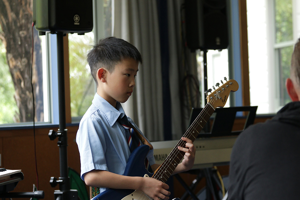 Wellesley boy plays the guitar, focused on his music